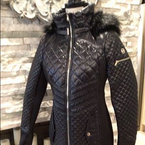 Micheal kors black quilted coat new with out tags